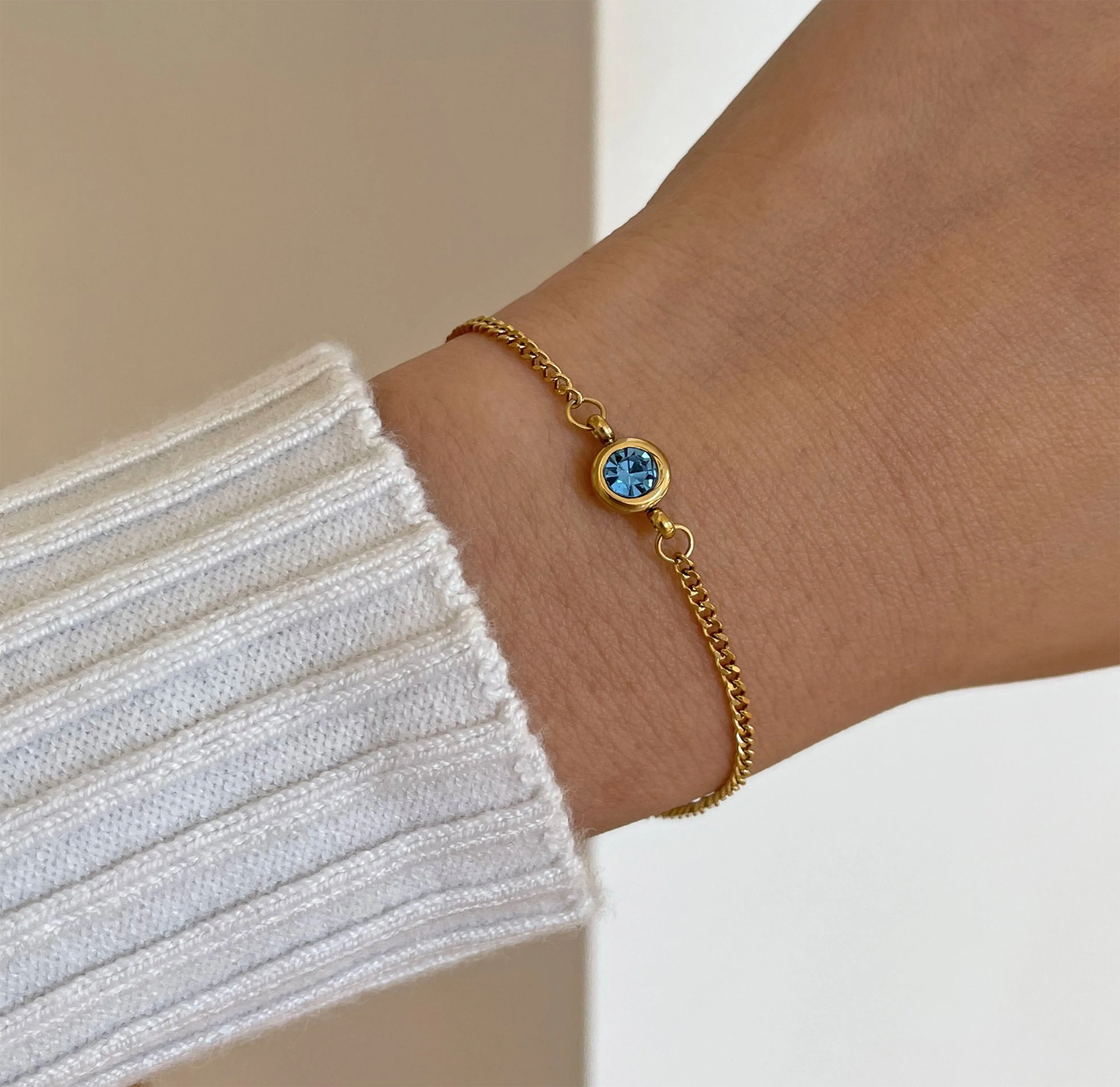 DELILAH GOLD DAINTY BLUE TOPAZ BIRTHSTONE BRACELET - DECEMBER