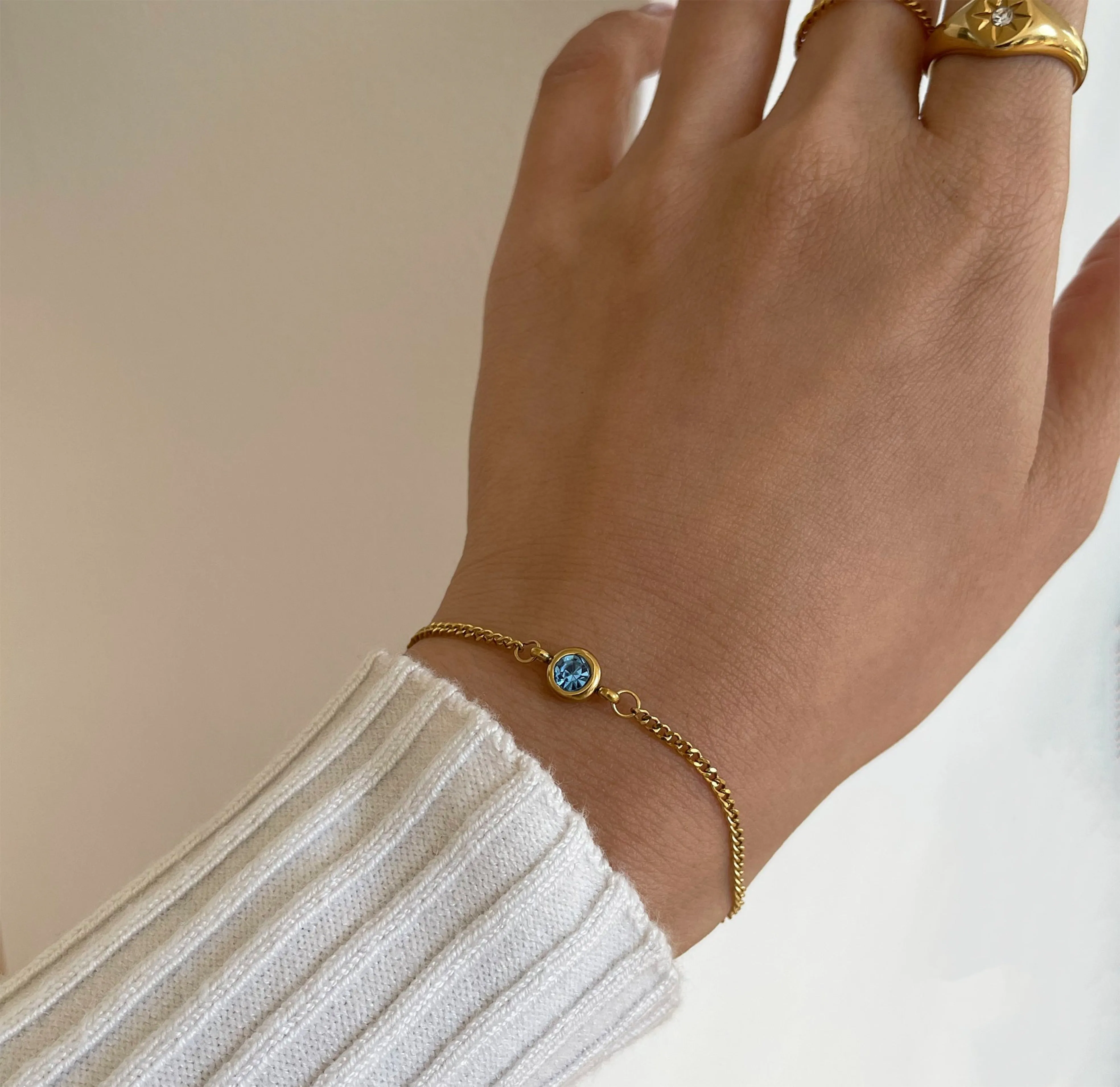 DELILAH GOLD DAINTY BLUE TOPAZ BIRTHSTONE BRACELET - DECEMBER